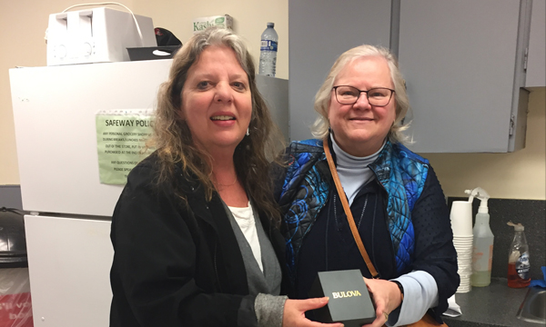 Cindy (L) is presented with her UFCW 401 retirement gift by relief union rep Tia