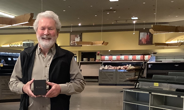 While setting up the new store, Robert has his retirement gift delivered to him by his Walking Steward