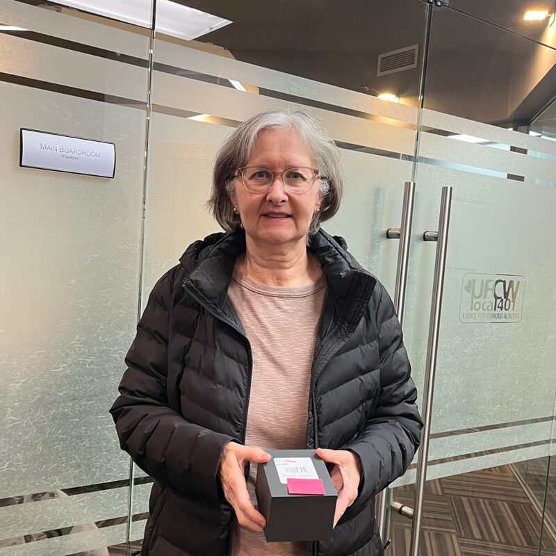 Sandra Dororsh receives her retirement watch.